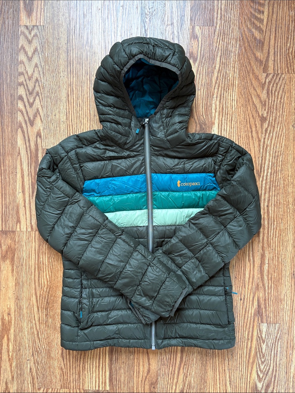 cotopaxi Olive Puffer Jacket with Blue, Teal, and Mint Stripes